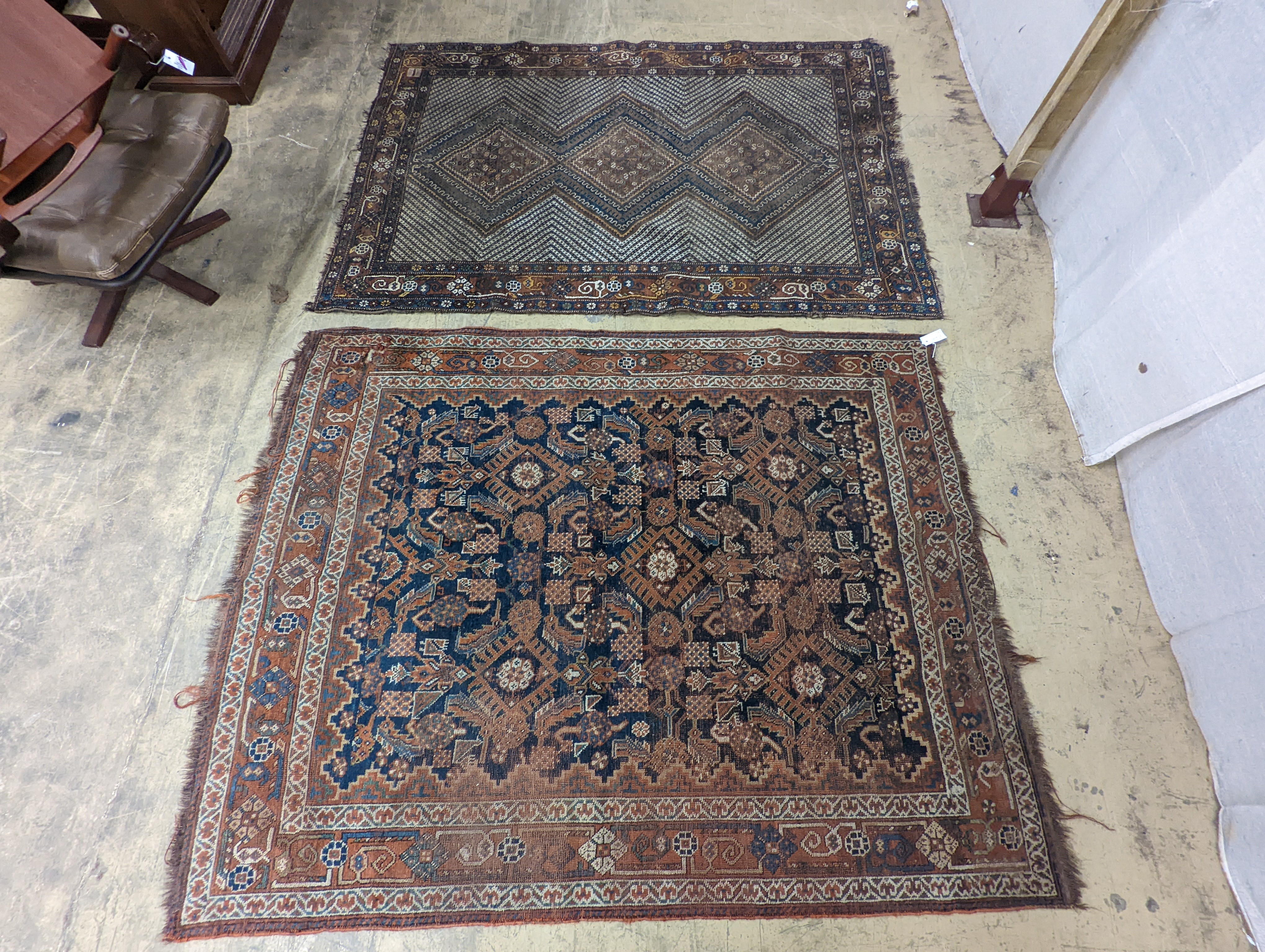 Two antique Caucasian rugs, larger 200 x 135cm